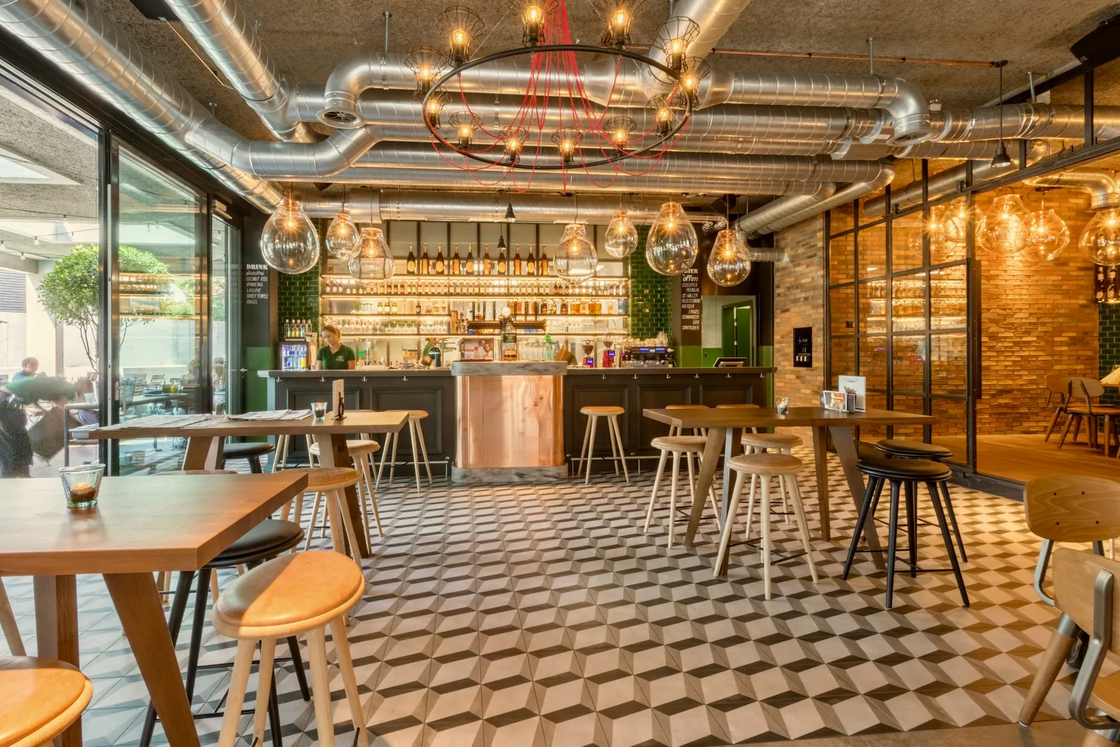 A restaurant dining room set for evening service