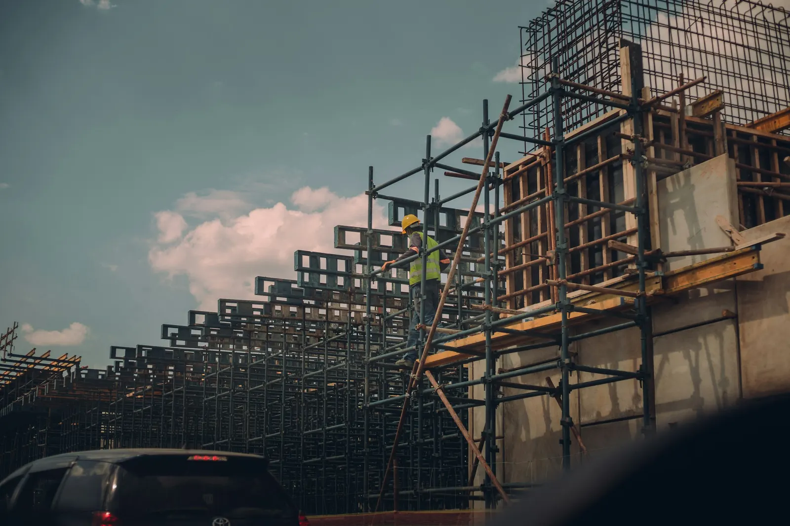 A residential construction site with scaffolding
